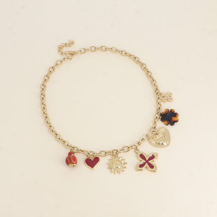 Collier - pendentifs (trèfles, coeurs, émail, soleil, fleur en résine léopard)