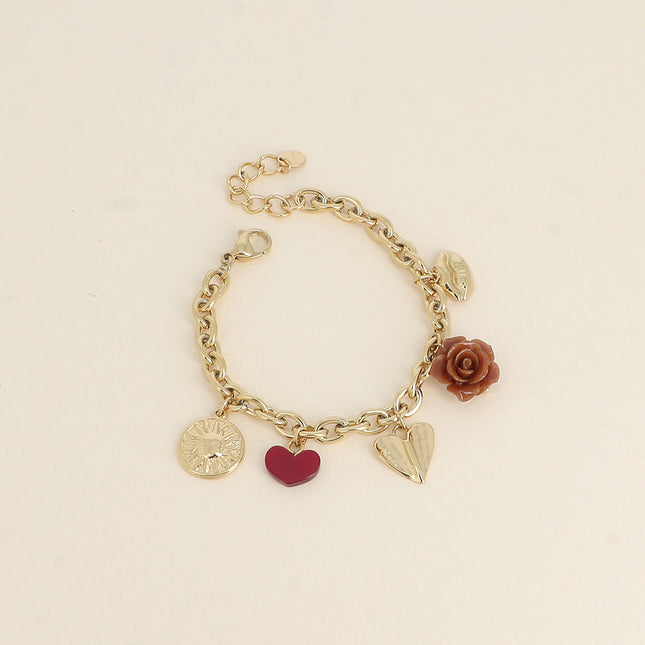 Bracelet Octavie - breloques diverses (soleil, coeur en résine, coeur incurvé, rose en résine, bouche)