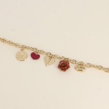 Bracelet Octavie - breloques diverses (soleil, coeur en résine, coeur incurvé, rose en résine, bouche)