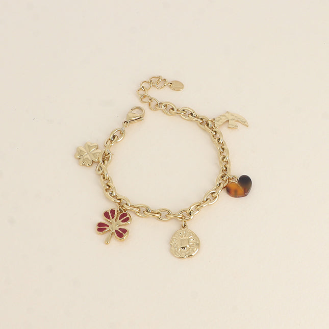 Bracelet - pendants (clovers with enamel, sun, resin heart, hammered bird)