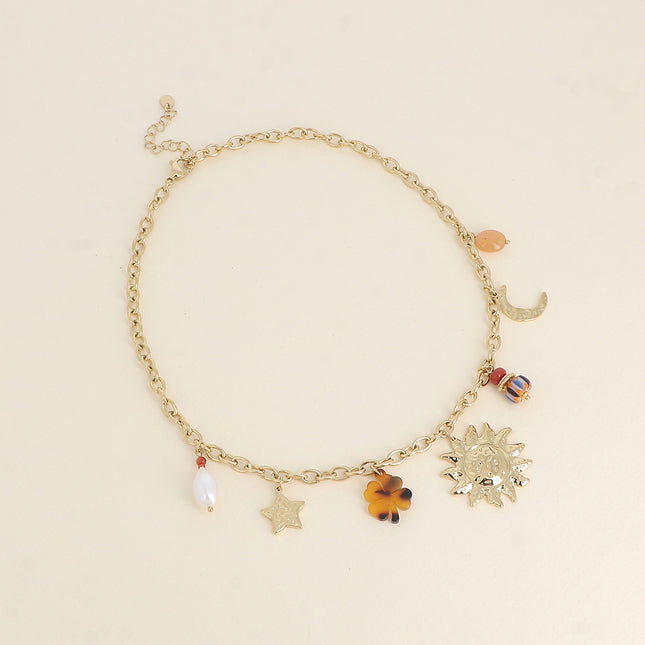 Necklace - pendants (hammered sun, star and moon, resin leopard clover and beads)