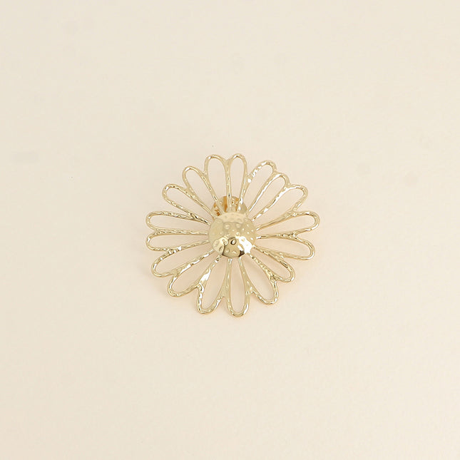 Pin's Icolia - motif marguerite ajouré