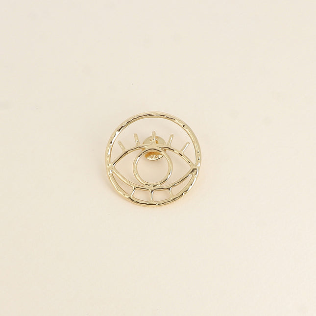 Pin's - motif oeil ajouré