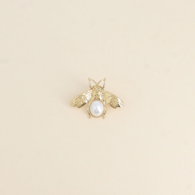 Pin's - motif scarabée avec perle de résine