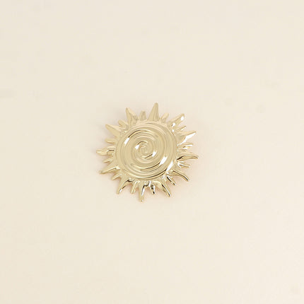 Brooch - sun motif