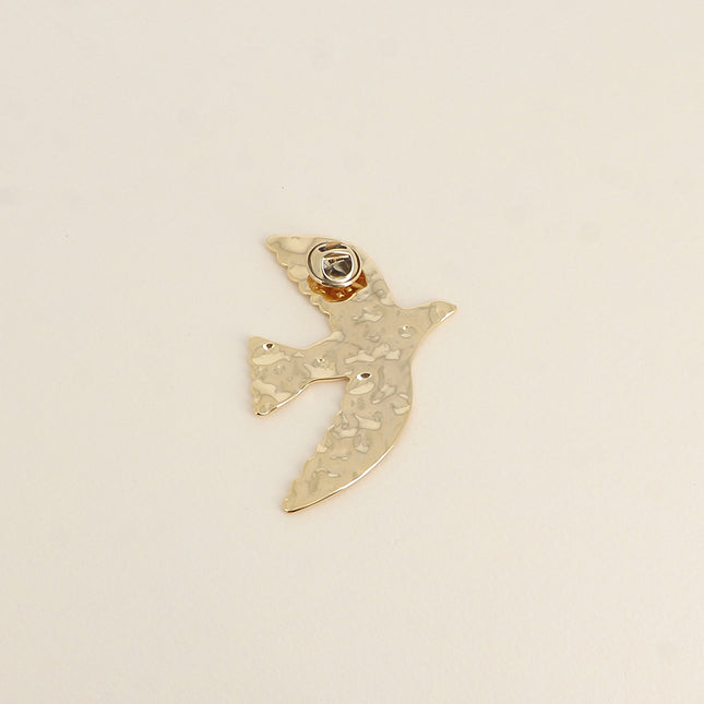 Pin's - motif oiseau texturé