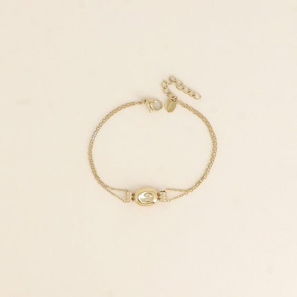 Bracelet - petite pastille bombée et incurvée