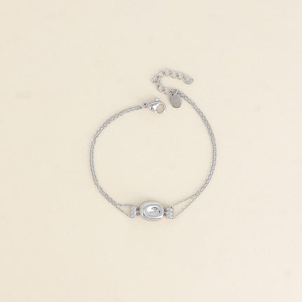 Bracelet - petite pastille bombée et incurvée