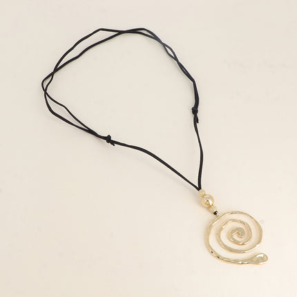Sautoir sur cordon - pendentif spirale