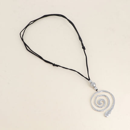 Sautoir sur cordon - pendentif spirale