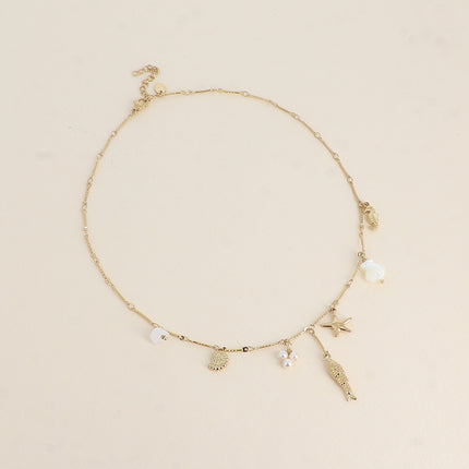 Collier - breloques du thème marin (perles de résine, étoile de mer, poisson, coquillages et hippocampe)