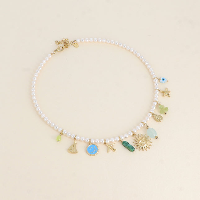 Necklace on a thread - white resin beads, star, snail shell, sun, airplane, sailboat, enameled smiley face, natural stone