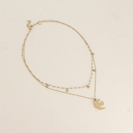 Collier 2 rangs - pendentif en forme d'oiseau, perles de résine blanche