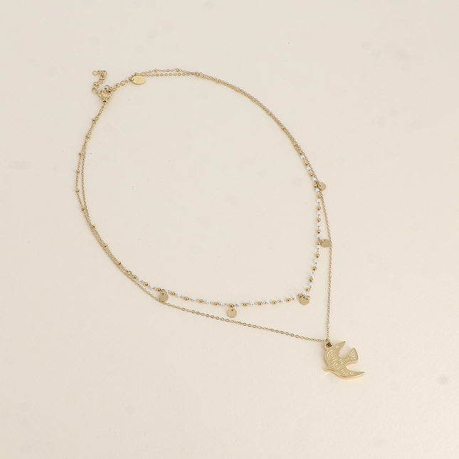 Two-strand necklace - bird-shaped pendant, white resin beads