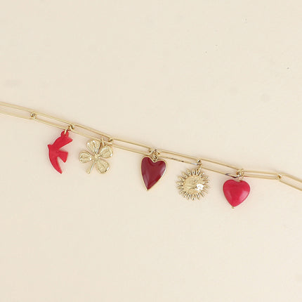 Bracelet - pendentifs (coeur martelé, oiseau en résine, coeur en émail, fleur, coeur en pierre naturelle)