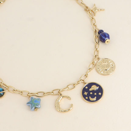 Collier - maille aux anneaux ovales allongés, croissant de lune, perles en céramiques, ciel étoilée émaillée, soleil
