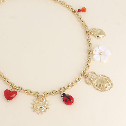 Collier - soleil, coccinelle en céramique émaillée, scarabée, fleur nacrée, coeurs