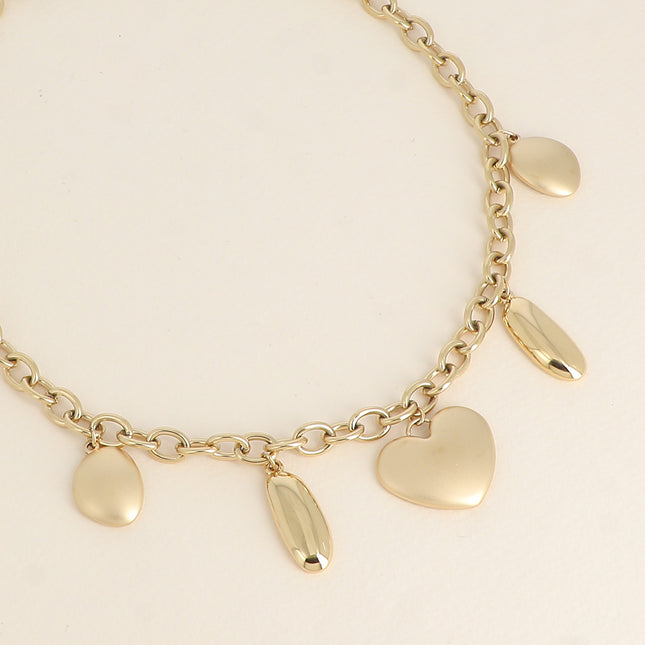 Necklace - heart with a matte finish and flat geometric shapes