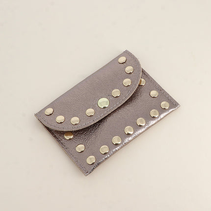 Pochette Rock - cloutée, véritable cuir de vachette, 1 compartiment