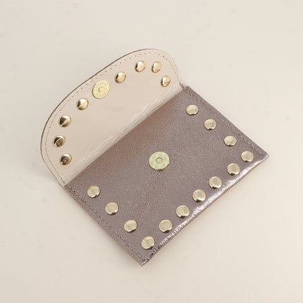 Pochette Rock - cloutée, véritable cuir de vachette, 1 compartiment
