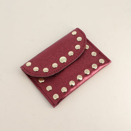 Pochette Rock - cloutée, véritable cuir de vachette, 1 compartiment