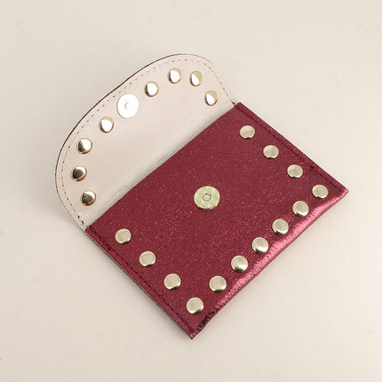 Pochette Rock - cloutée, véritable cuir de vachette, 1 compartiment