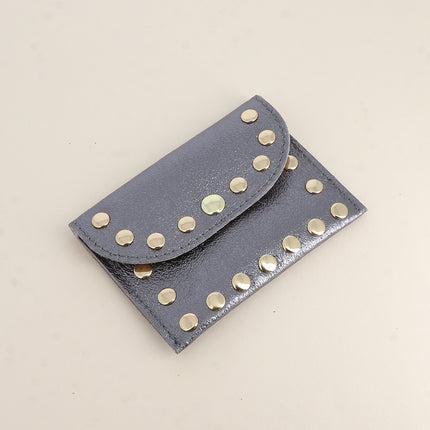 Pochette Rock - cloutée, véritable cuir de vachette, 1 compartiment