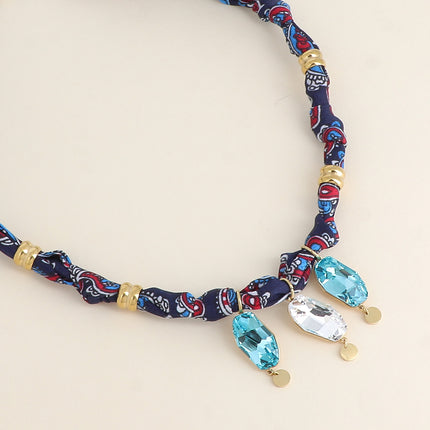 Collier sur tissu Tina - orné de 3 cristaux Swarovski®