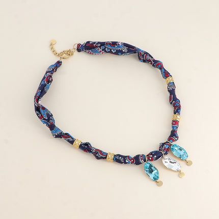 Collier sur tissu Tina - orné de 3 cristaux Swarovski®