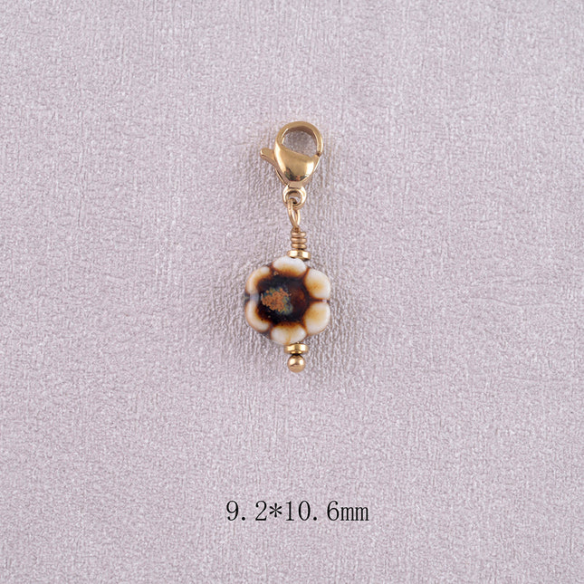 Charm - fleur en céramique émaillée