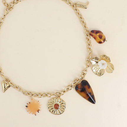 Collier Louis - coeur, soleil nacré, fleur martelée, coeur en résine, fleur, perle en résine, botte