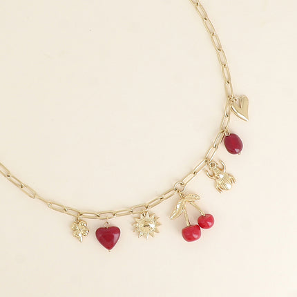 Collier - trèfle, scarabée, soleil, cerise, perles, coeurs