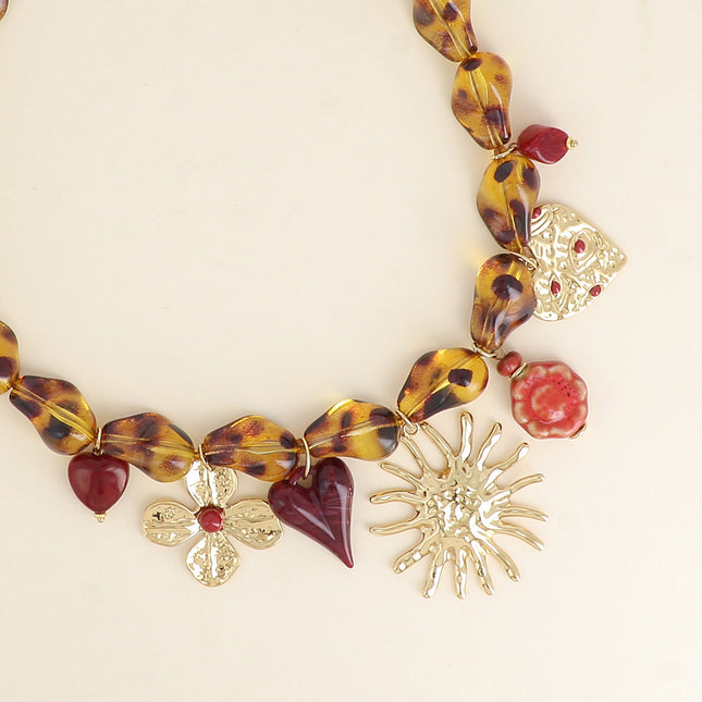 Necklace on a thread - beads, hearts, hammered sun, glazed ceramic, clover