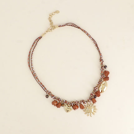 Collier sur cordon - perles fleurs et breloques en acier inoxydable (coeur, soleil et bouche)
