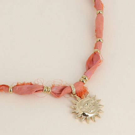 Collier en tissu Aquarela - motifs et pampille soleil souriant