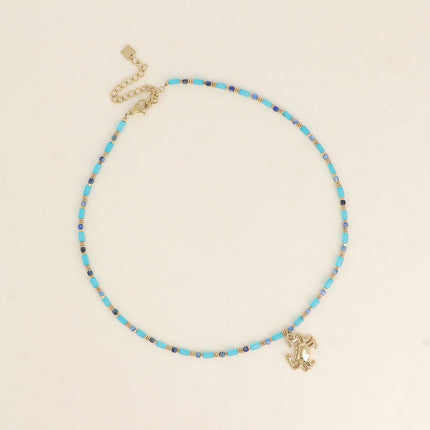 Collier Carlota - ras de cou, pierres naturelles et pendentif (crabe, lune, coeur, trèfle, fleur, soleil)