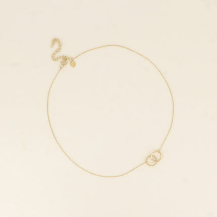 Collier - double anneau, l'un lisse et l'autre torsadé
