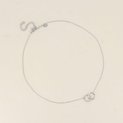 Collier - double anneau, l'un lisse et l'autre torsadé