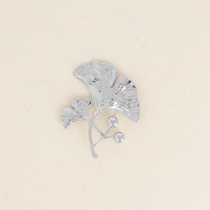 Avelia brooch - ginkgo motif with two white resin beads