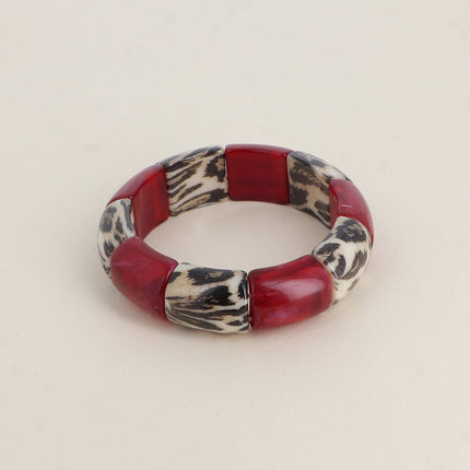 Bracelet élastie - perles en résine et en résine motif léopard