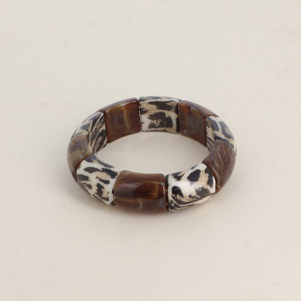 Bracelet élastie - perles en résine et en résine motif léopard