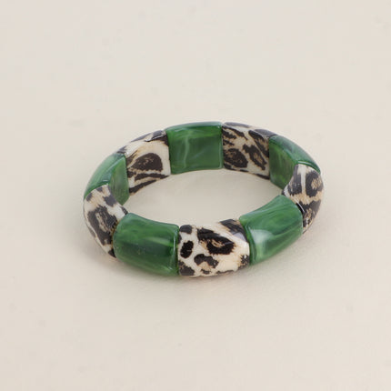 Bracelet élastie - perles en résine et en résine motif léopard