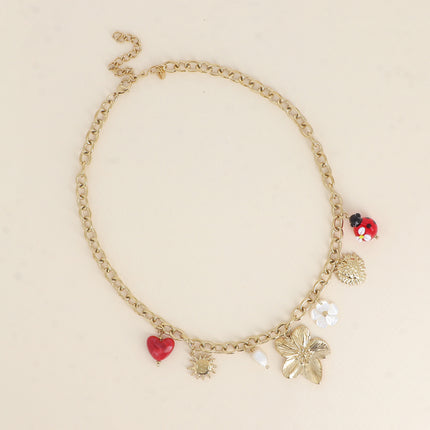 Collier - pendentifs (fleur, coccinelle en résine, scarabée, fleur nacrée, coeur, soleil)