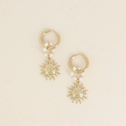 Créoles - anneau de perles d'eau douce et pendentif soleil