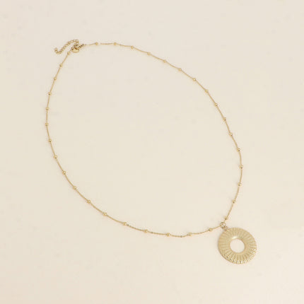 Collier - grand pendentif rond texturé