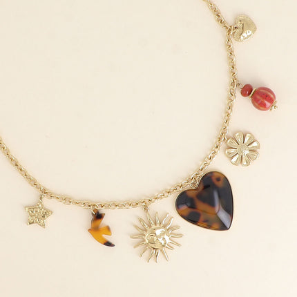 Collier Lior - pendentifs (étoile, soleil, oiseau en résine, coeur en émail, fleur, perles, coeur)