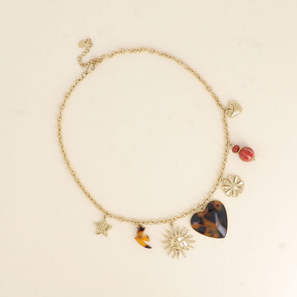 Collier Lior - pendentifs (étoile, soleil, oiseau en résine, coeur en émail, fleur, perles, coeur)
