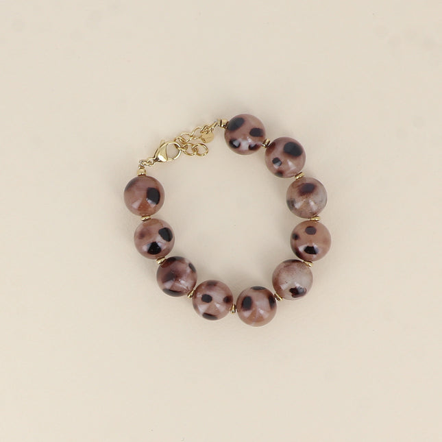 Bracelet on cable - leopard print resin ball beads