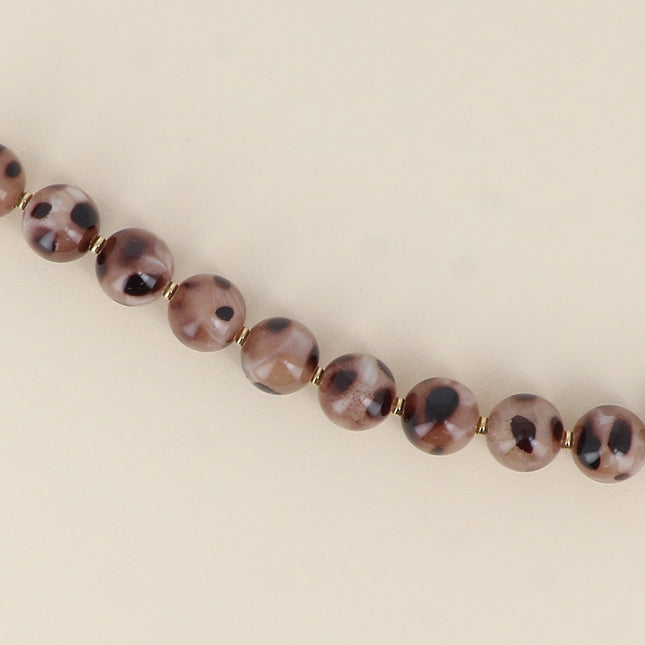 Bracelet on cable - leopard print resin ball beads