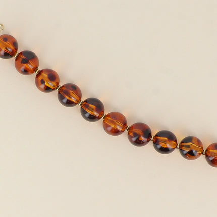 Bracelet on cable - leopard print resin ball beads